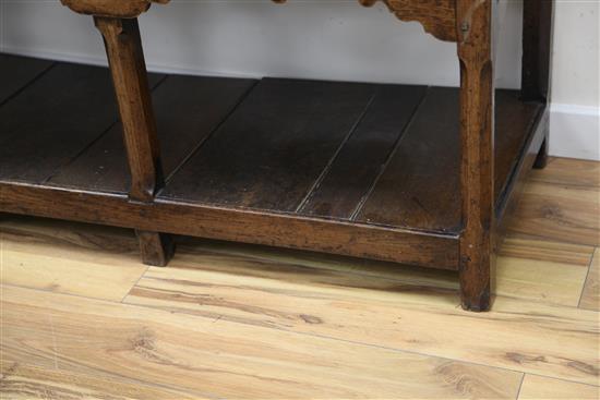 An 18th century oak dresser, W.5ft 1in. H.6ft 5in.